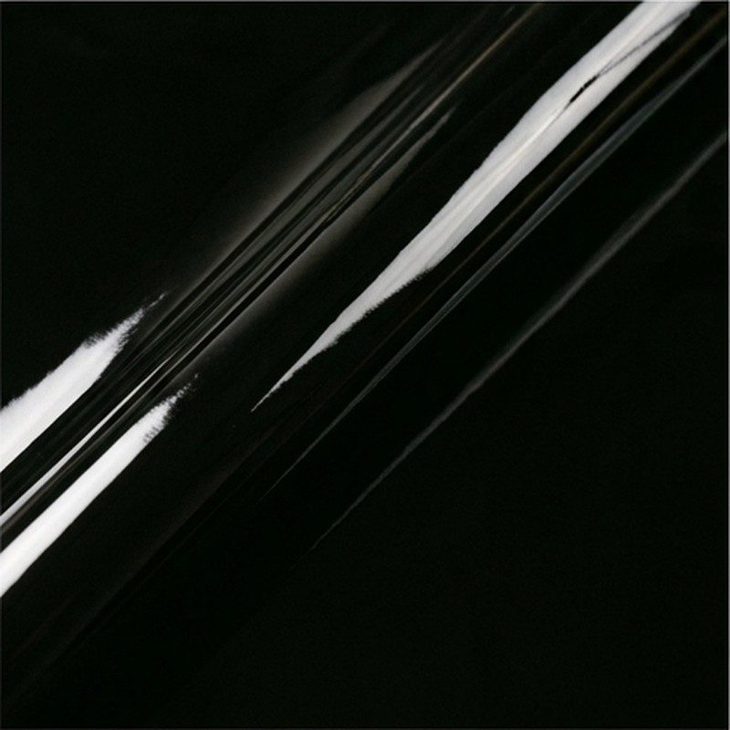 Macro di pelle verniciata nera con riflesso a specchio